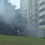 IN_TIME_TO_COME_3_Caption_routine_mosquito_fogging_casts_housing_estate_in_fog Still020